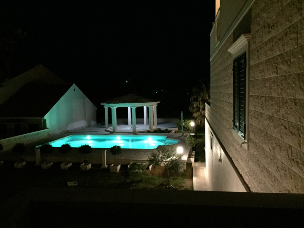 Swimming pool during the night. Swimming pool view.