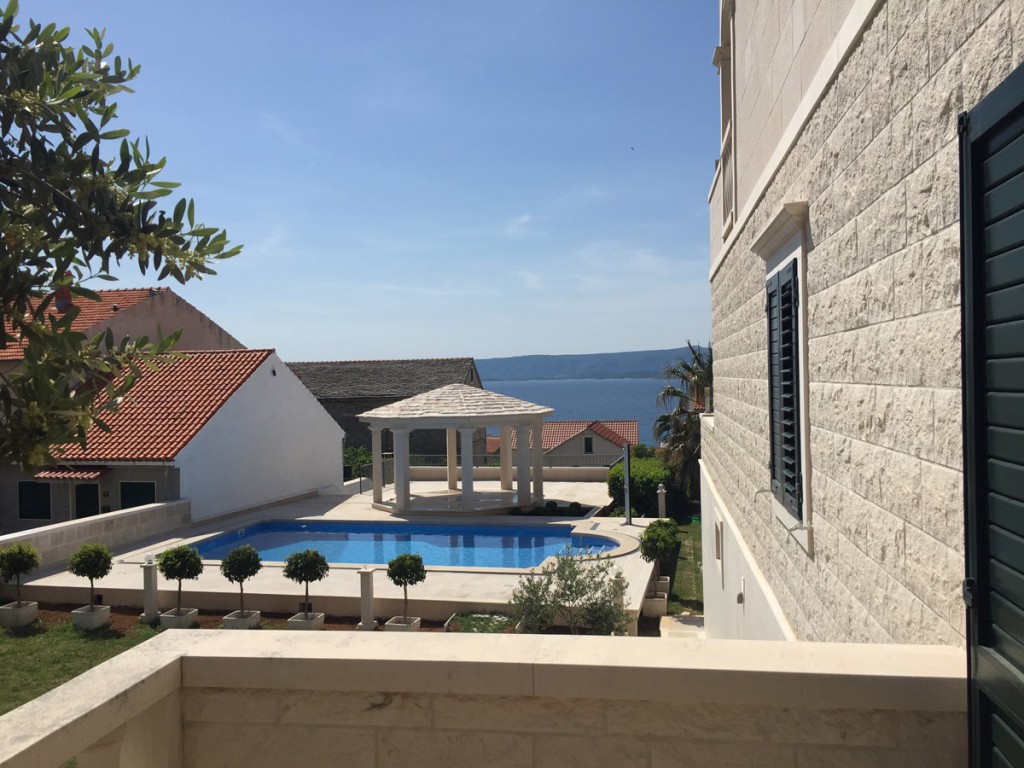 Amazing Villa Jadranka swimming pool during the day. Swimming pool view.